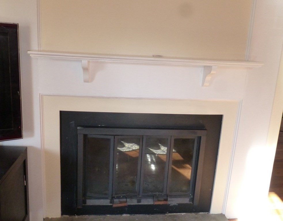 116 Russet Lane, Unit 116 Boxborough, MA 01719 - Photo 5 of 22 a close view of fireplace