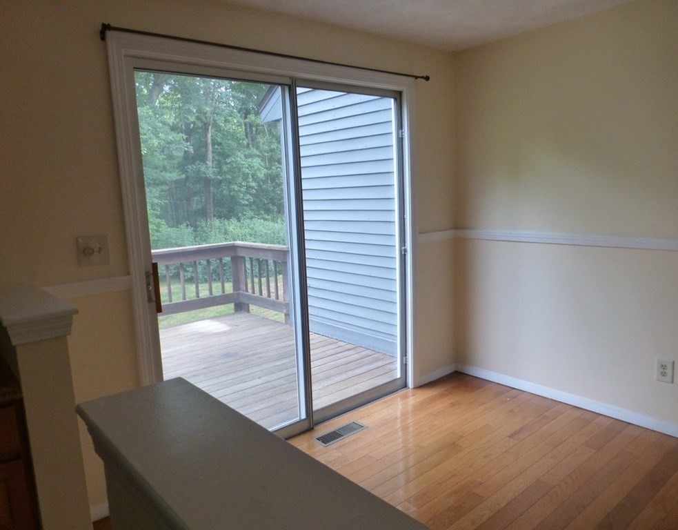 116 Russet Lane, Unit 116 Boxborough, MA 01719 - Photo 6 of 22 a view of a room with a window