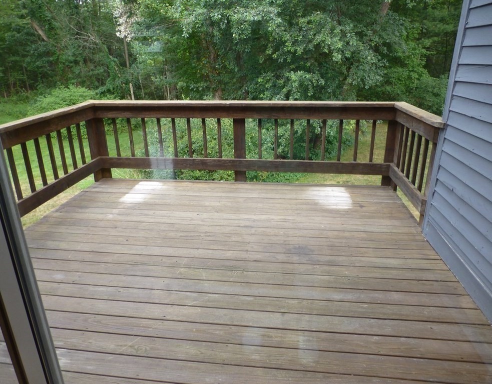 116 Russet Lane, Unit 116 Boxborough, MA 01719 - Photo 8 of 22 a view of balcony with wooden floor