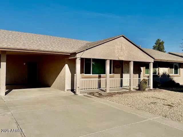 a house with yard in front of it