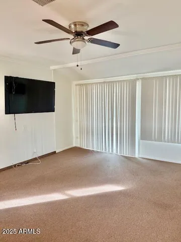 a view of a livingroom with a flat screen tv