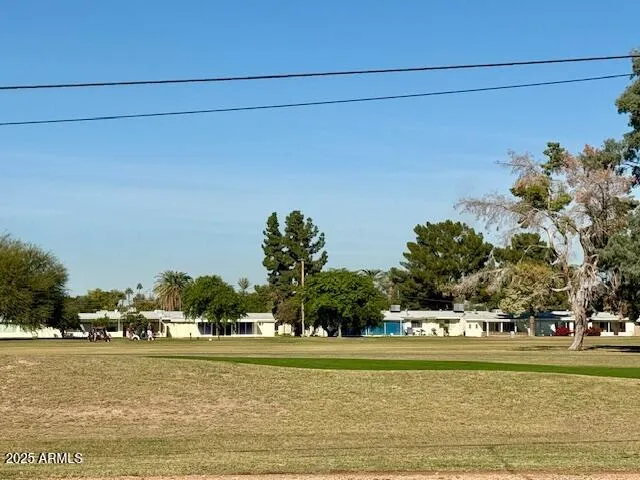 a front view of a building with ocean view