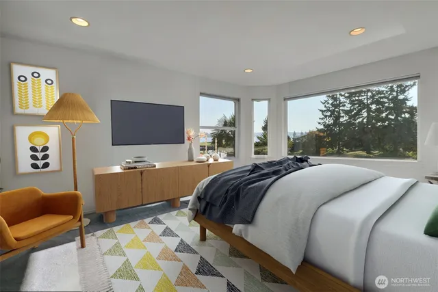 a bedroom with a bed and glass window