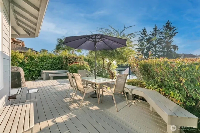 a view of a chairs and table on the wooden floor