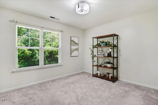 a bathroom with double sink and a mirror