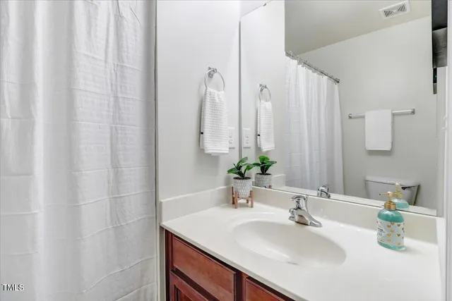 a bedroom with a bed furniture and a window