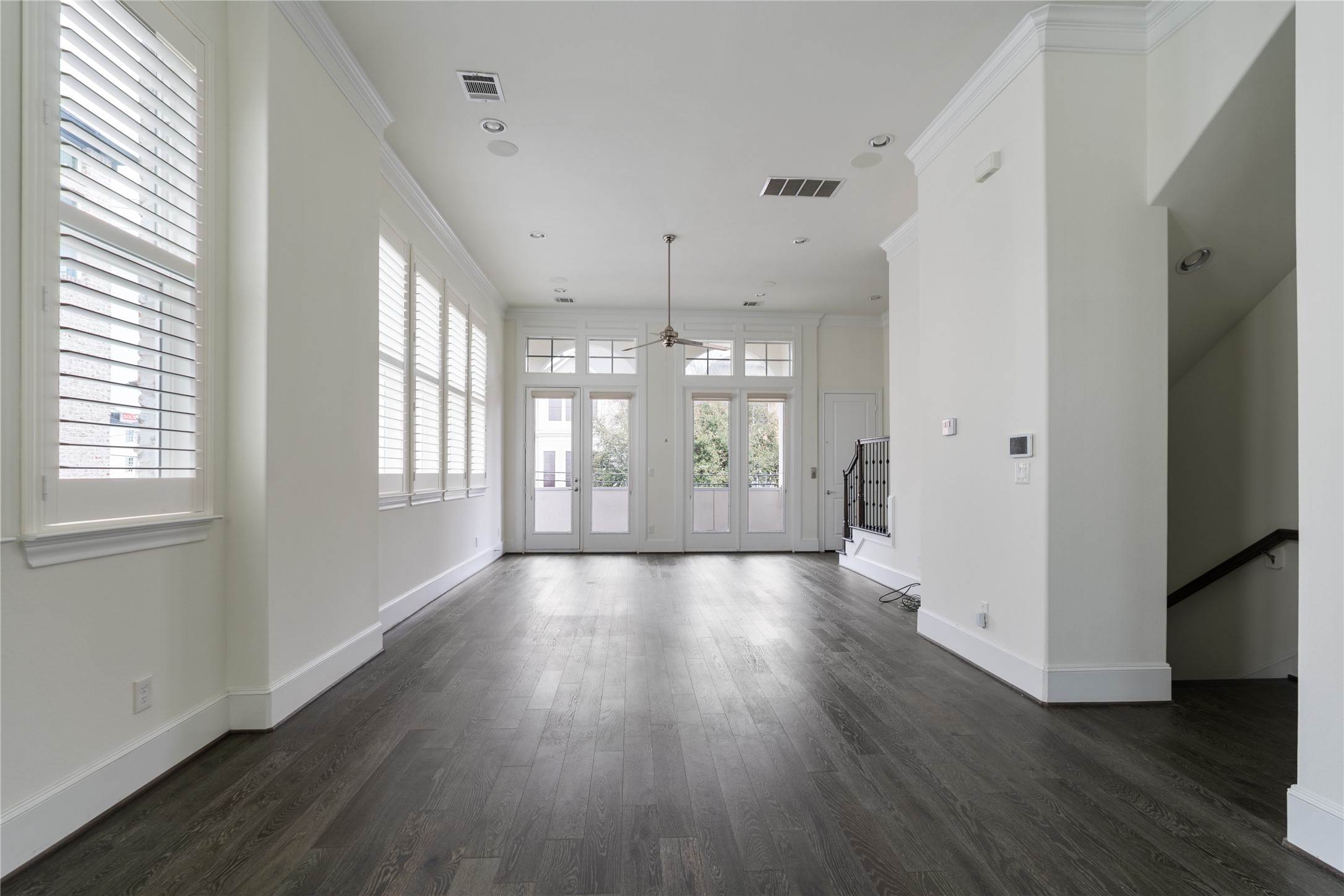 2613 Maxroy Street Houston, TX 77007 - Photo 11 of 43 The kitchen flows seamlessly into the living area, maintaining connection while preserving defined spaces.