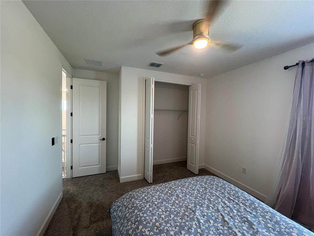 931 Signet Drive Apollo Beach, FL 33572 - Photo 17 of 22 a view of a bedroom