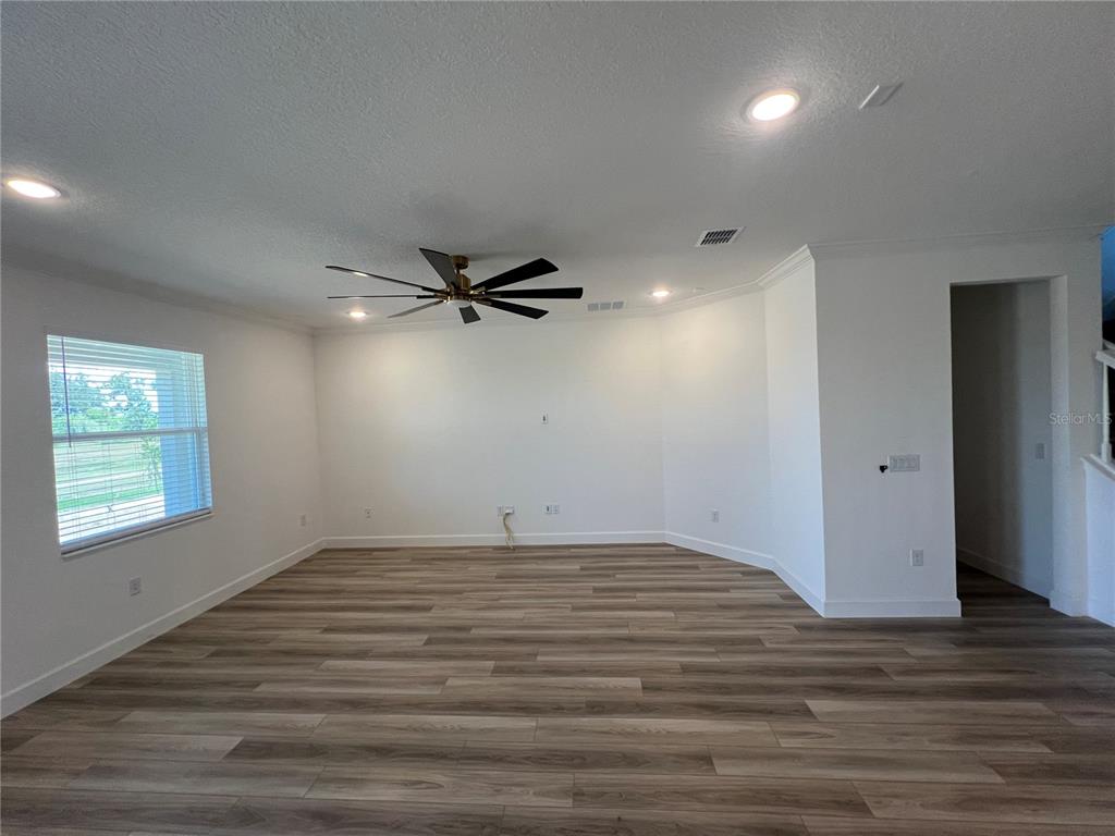 931 Signet Drive Apollo Beach, FL 33572 - Photo 5 of 22 wooden floor in an empty room