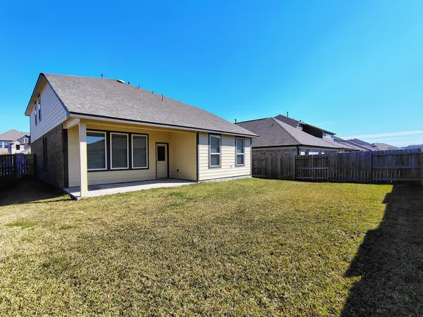 a house view with a garden space