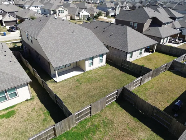 an aerial view of houses with deck