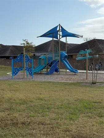 a view of a playground with a slide