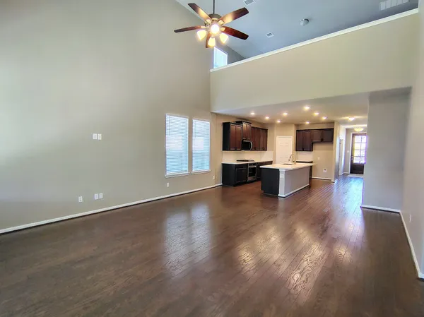 a view of a kitchen with a sink and a stove