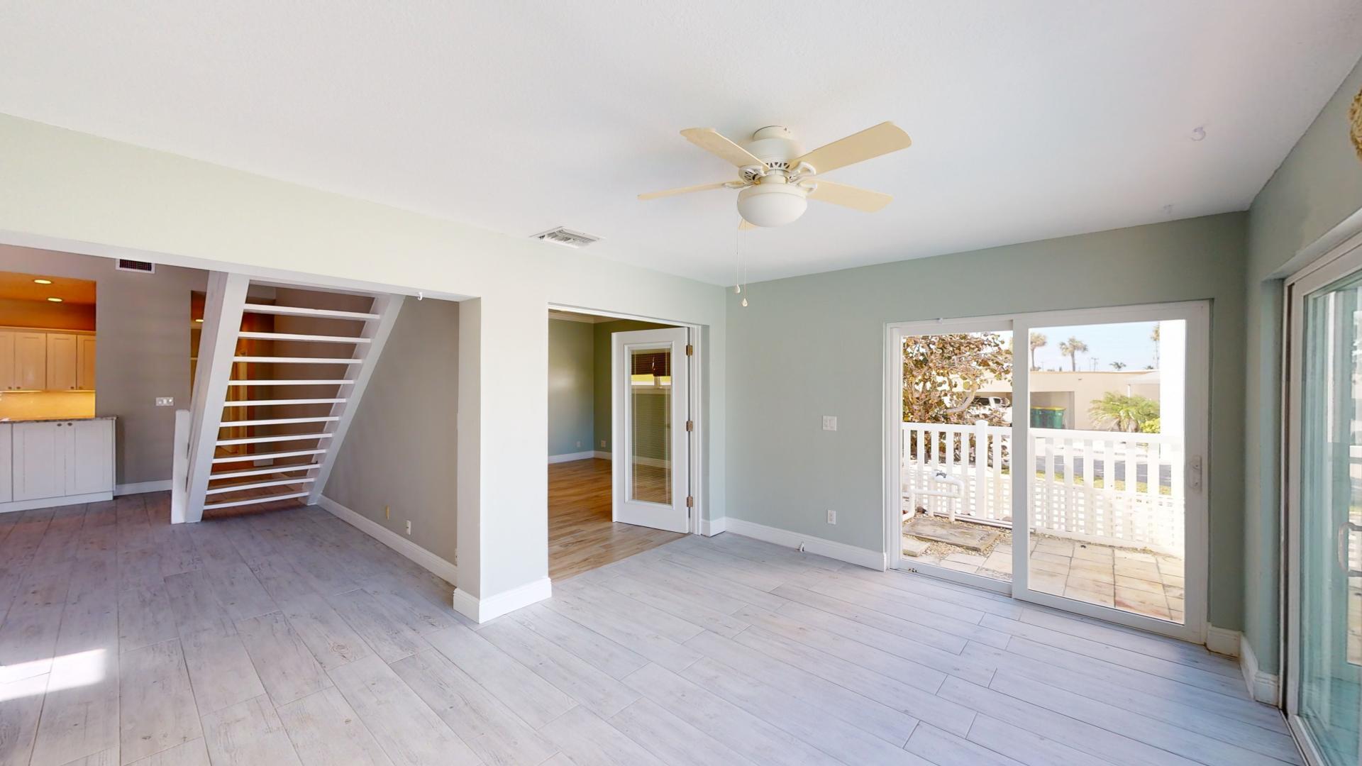 959 N Highway Indialantic, FL 32903 - Photo 22 of 70 a view of empty room with wooden floor and fan