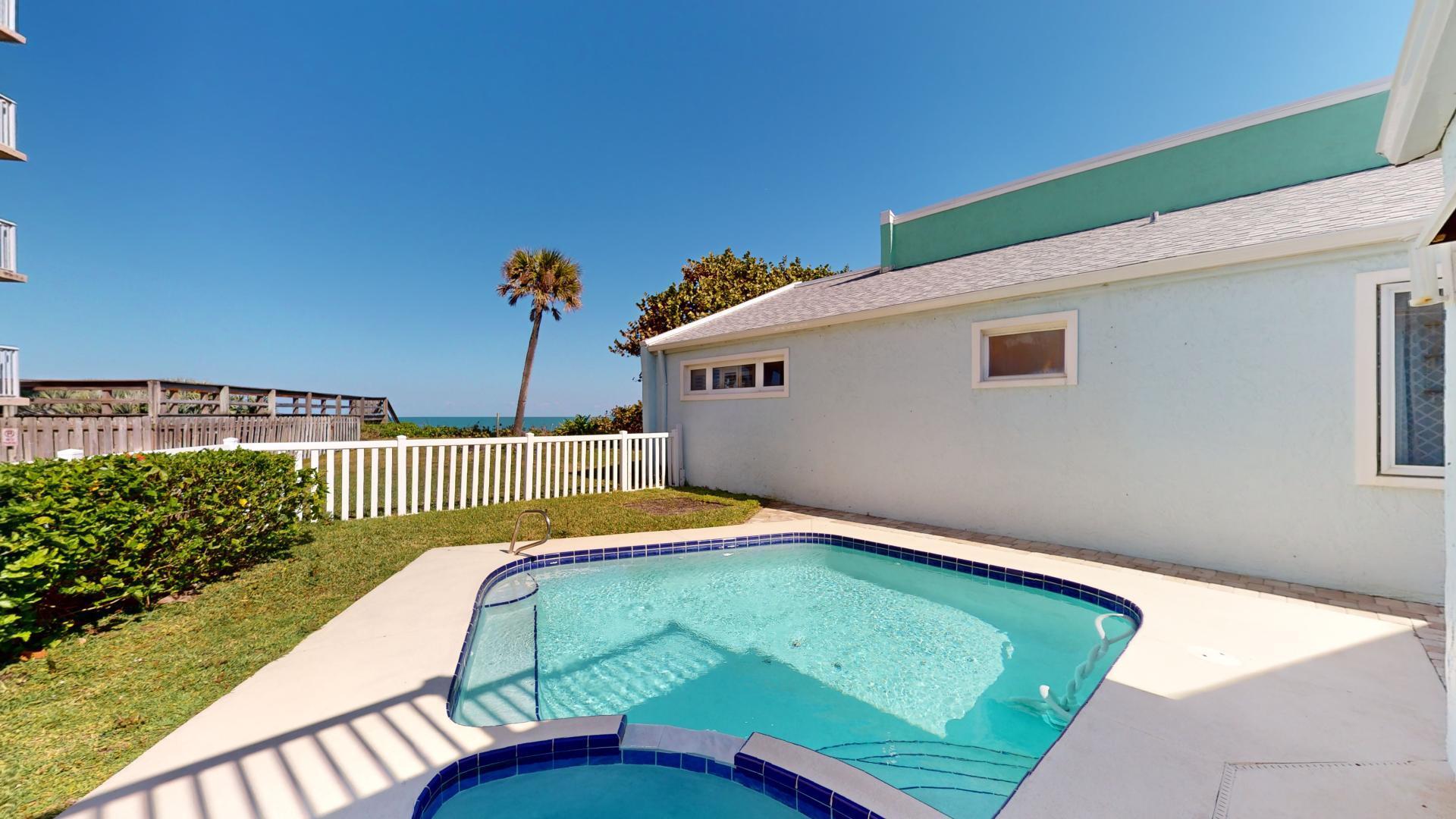 959 N Highway Indialantic, FL 32903 - Photo 26 of 70 a backyard with a table and chairs