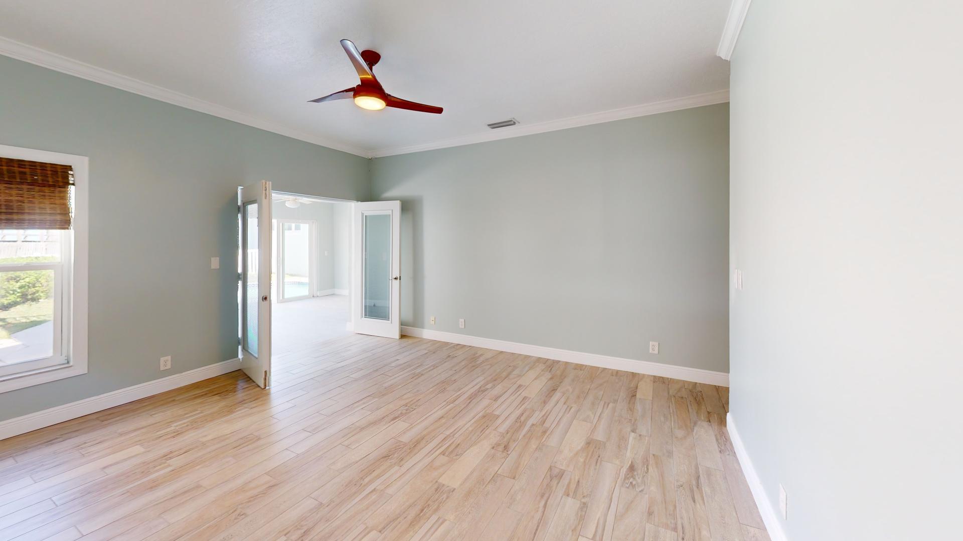 959 N Highway Indialantic, FL 32903 - Photo 40 of 70 wooden floor in an empty room with a window
