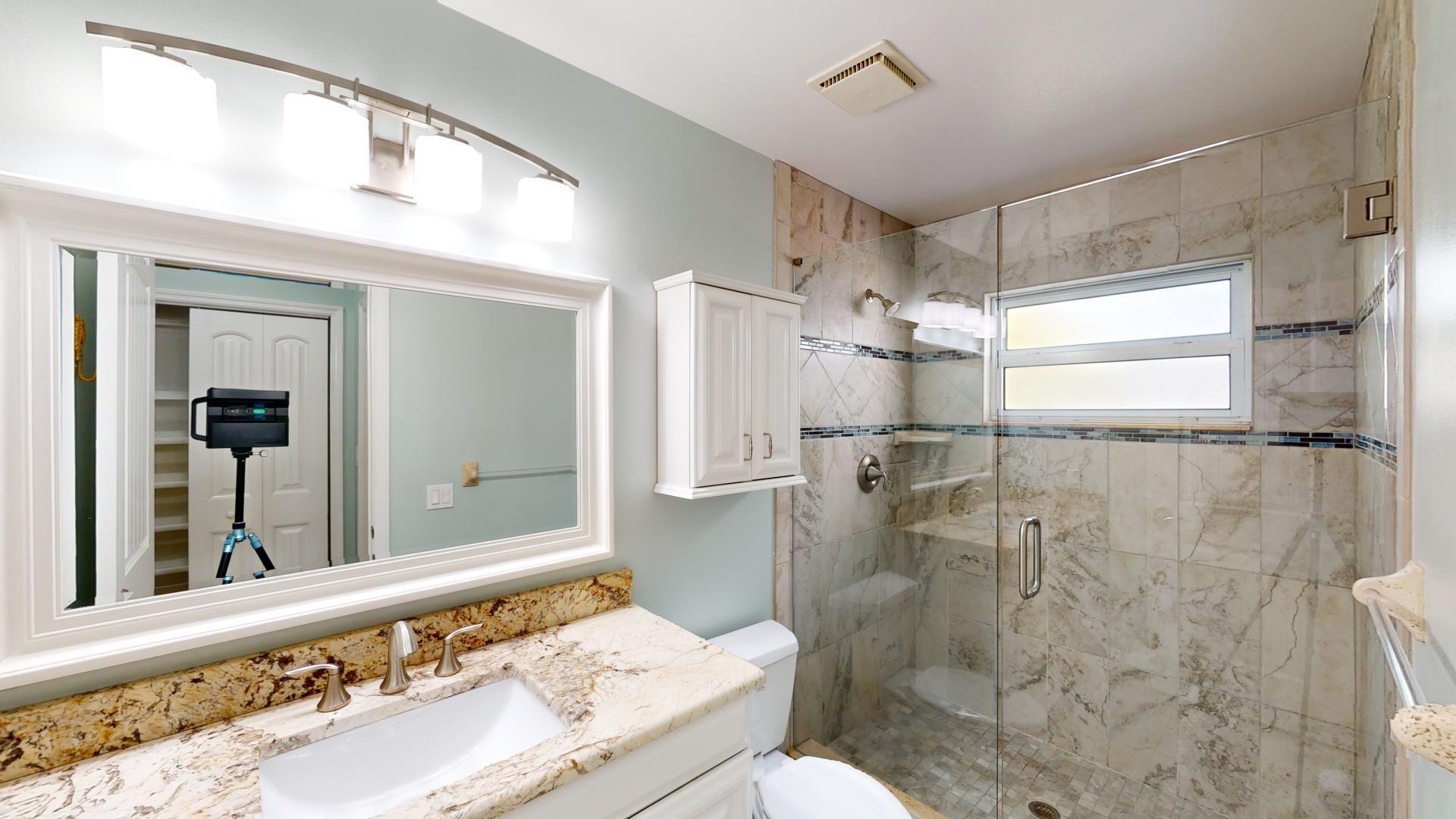 959 N Highway Indialantic, FL 32903 - Photo 51 of 70 a bathroom with a granite countertop shower sink and toilet