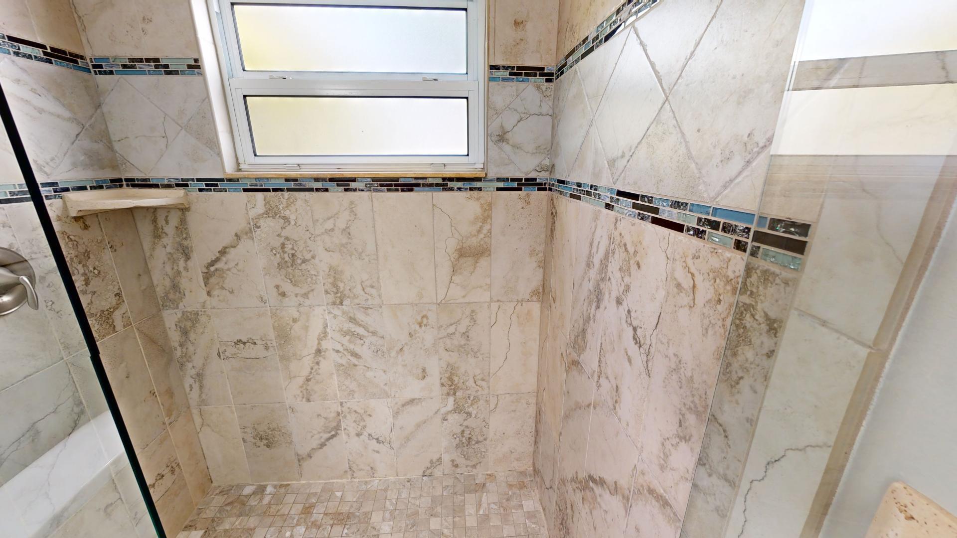 959 N Highway Indialantic, FL 32903 - Photo 53 of 70 a bathroom with a shower and a window