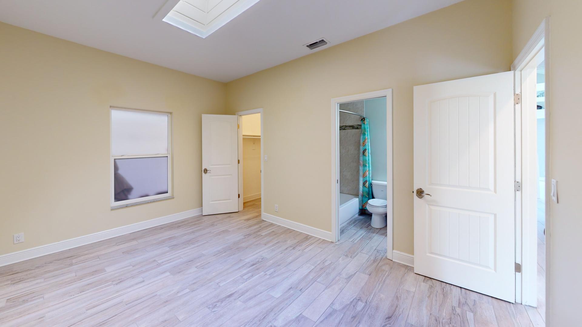 959 N Highway Indialantic, FL 32903 - Photo 56 of 70 an empty room with wooden floor and closet