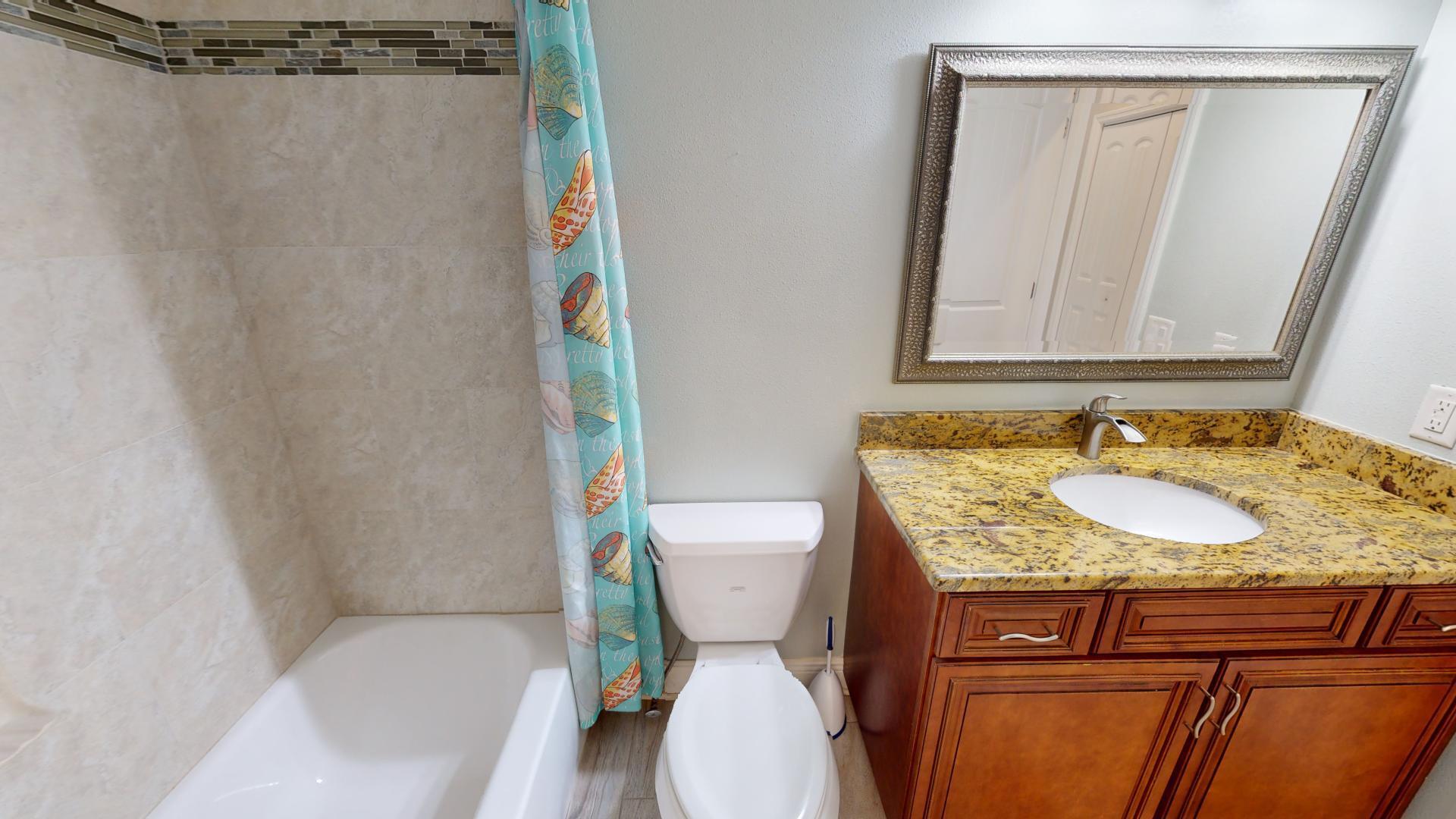 959 N Highway Indialantic, FL 32903 - Photo 60 of 70 a bathroom with a granite countertop sink and a mirror