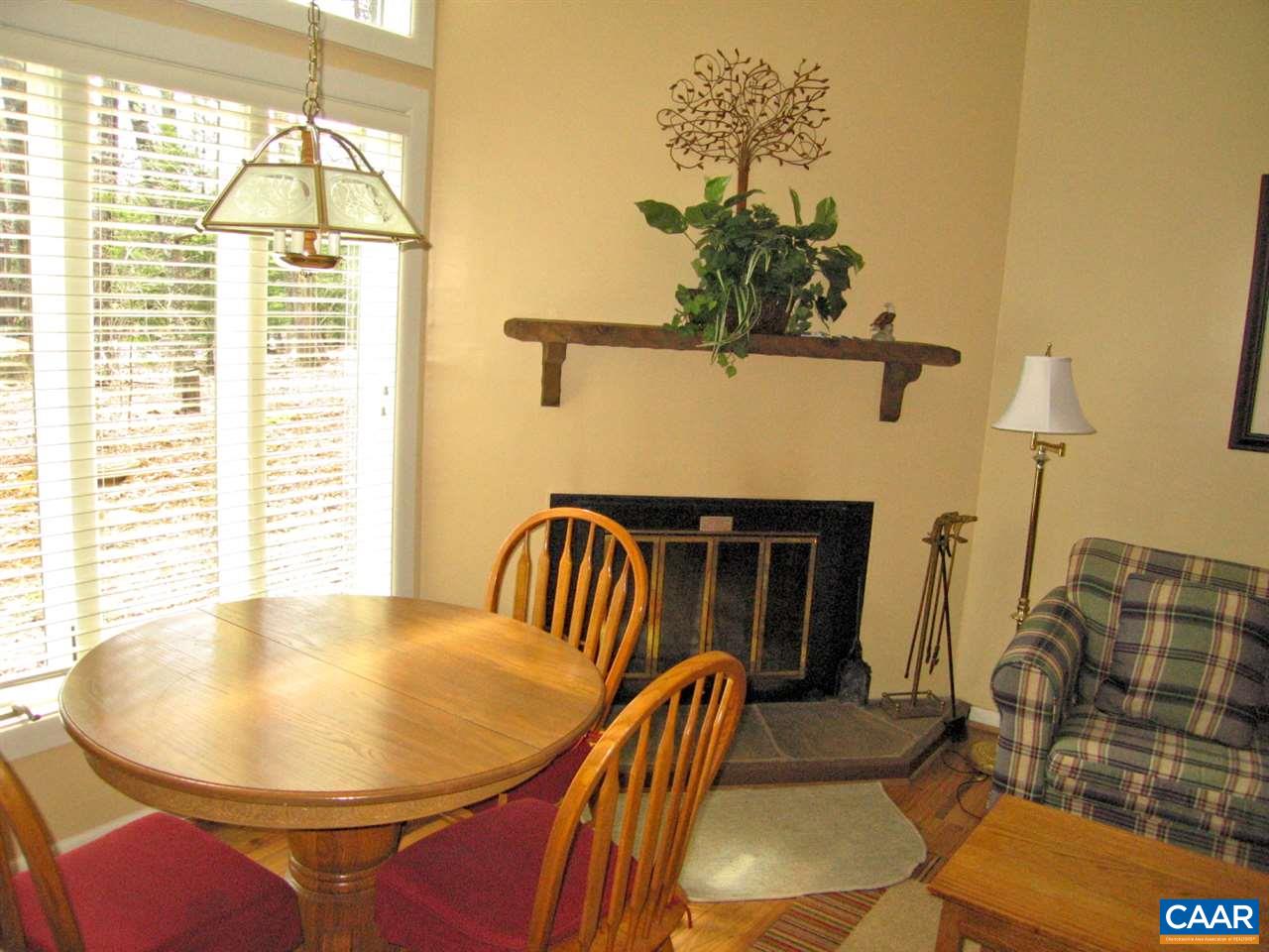 462 Three Ridges Roseland, VA 22967 - Photo 3 of 25 a view of a dining room with furniture and a chandelier