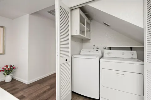 a utility room with dryer and washer