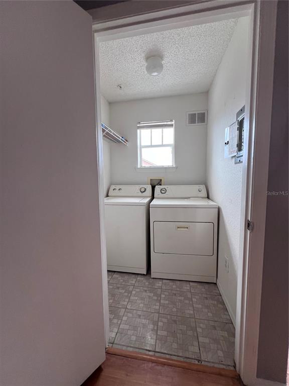 2202 Key W Court, Unit 633 Kissimmee, FL 34741 - Photo 13 of 33 a utility room with dryer and washer