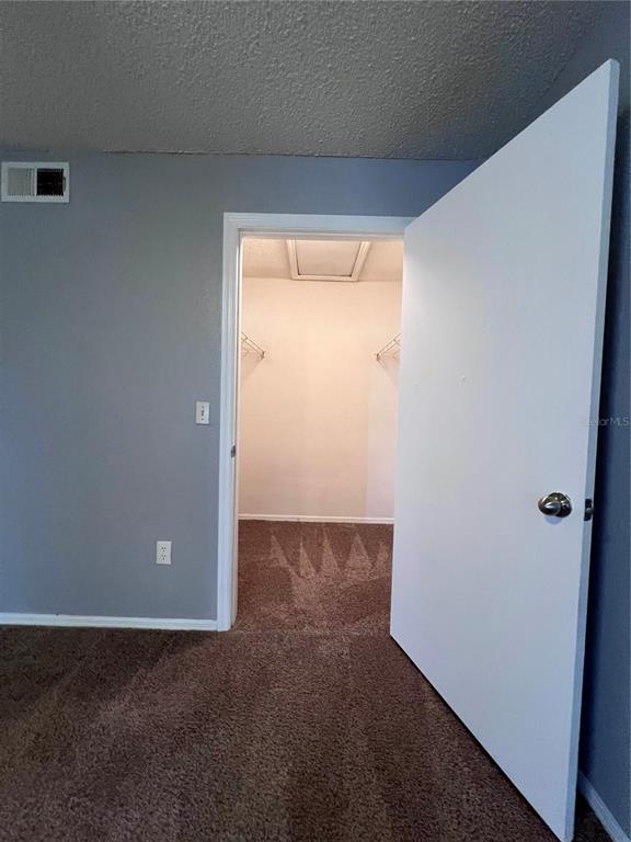 2202 Key W Court, Unit 633 Kissimmee, FL 34741 - Photo 15 of 33 an empty room with a door