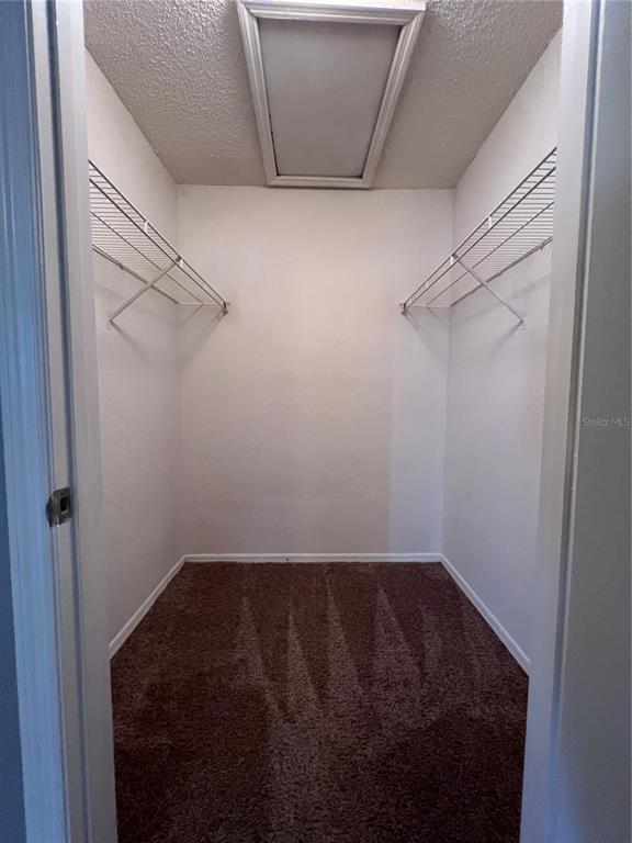2202 Key W Court, Unit 633 Kissimmee, FL 34741 - Photo 16 of 33 a view of a room with racks on the wall