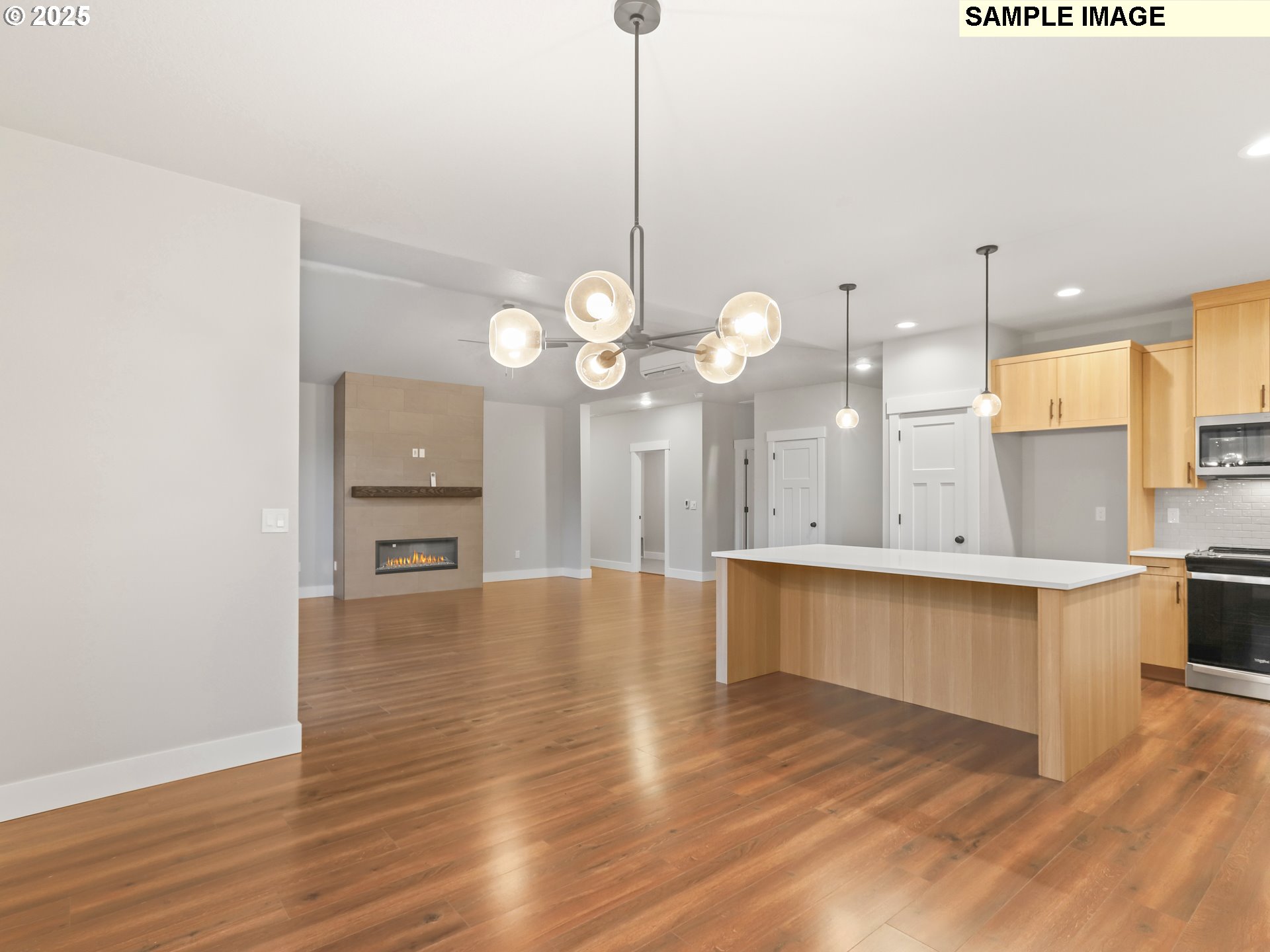 2240 East Otter Loop, Unit 52 La Center, WA 98629 - Photo 14 of 43 a large kitchen with kitchen island a island in the center