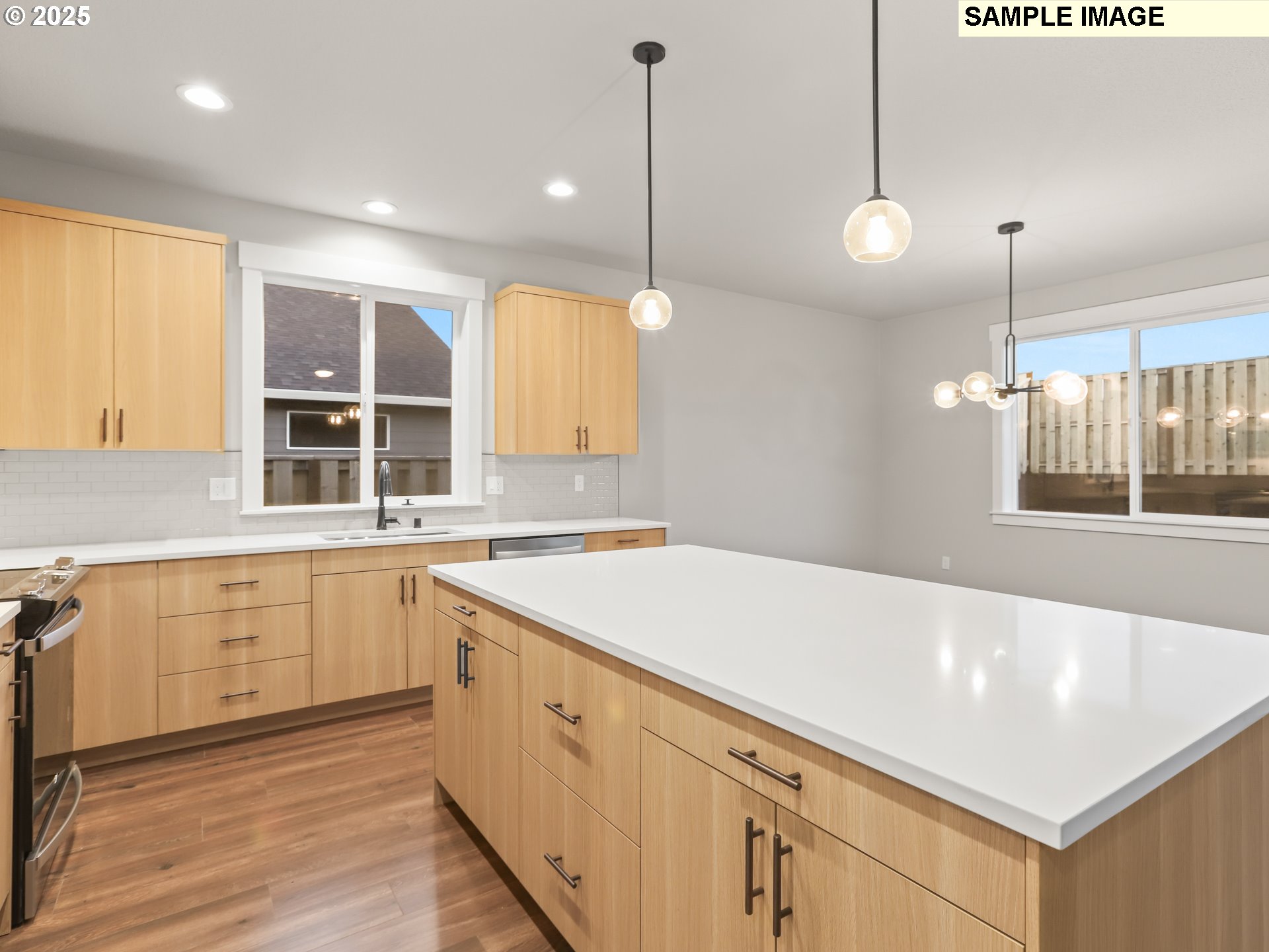 2240 East Otter Loop, Unit 52 La Center, WA 98629 - Photo 17 of 43 a kitchen with a sink cabinets and window