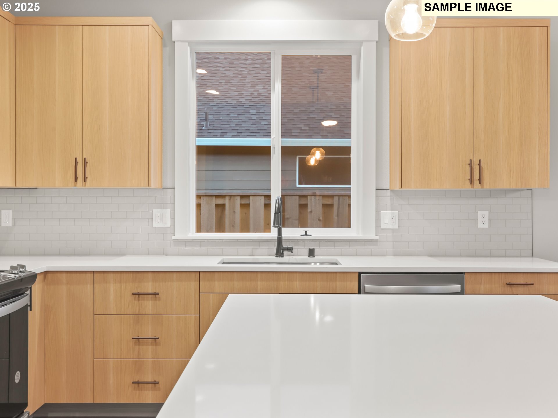 2240 East Otter Loop, Unit 52 La Center, WA 98629 - Photo 19 of 43 a kitchen with granite countertop white cabinets and a sink