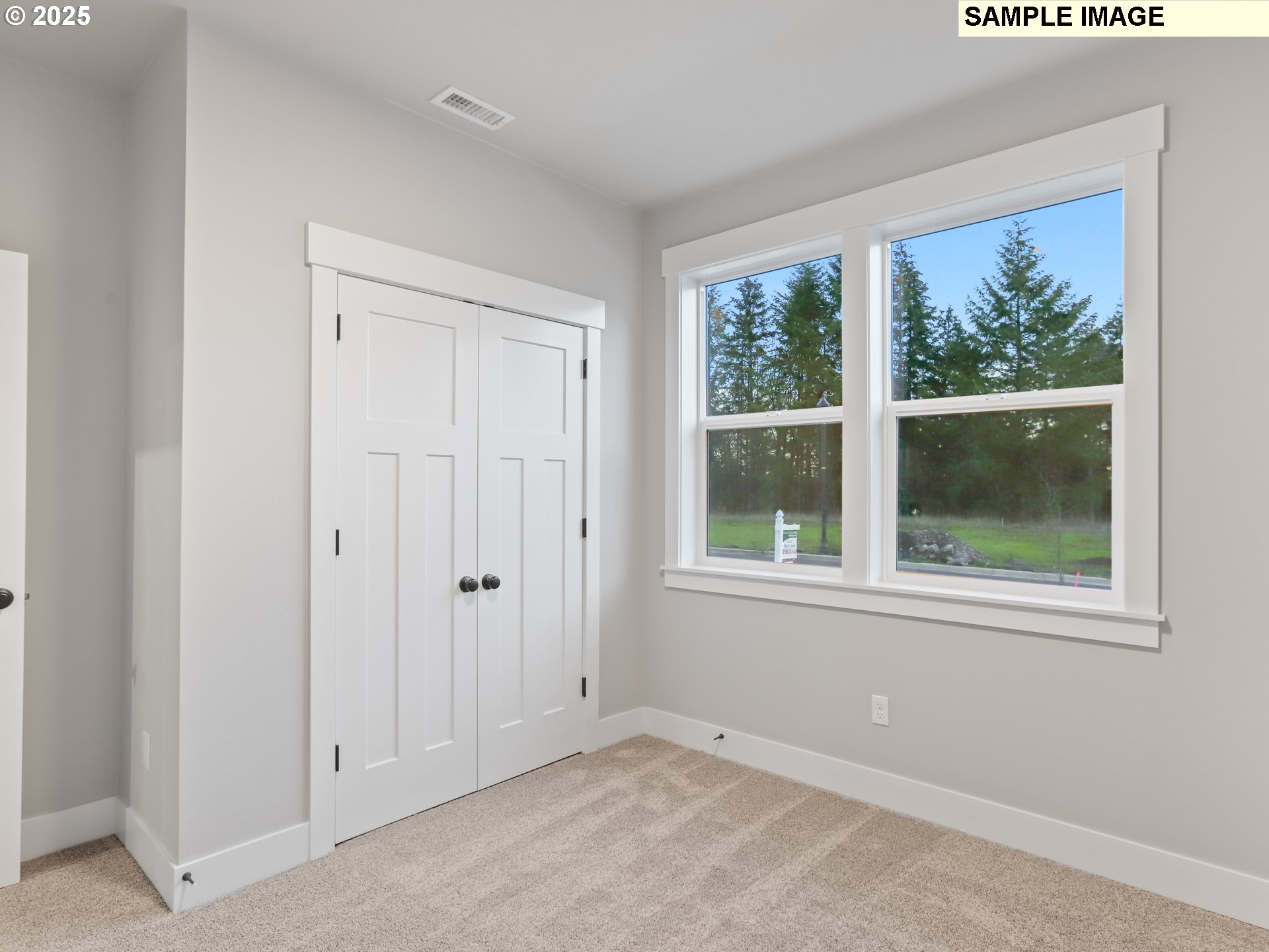 2240 East Otter Loop, Unit 52 La Center, WA 98629 - Photo 3 of 43 an empty room with windows