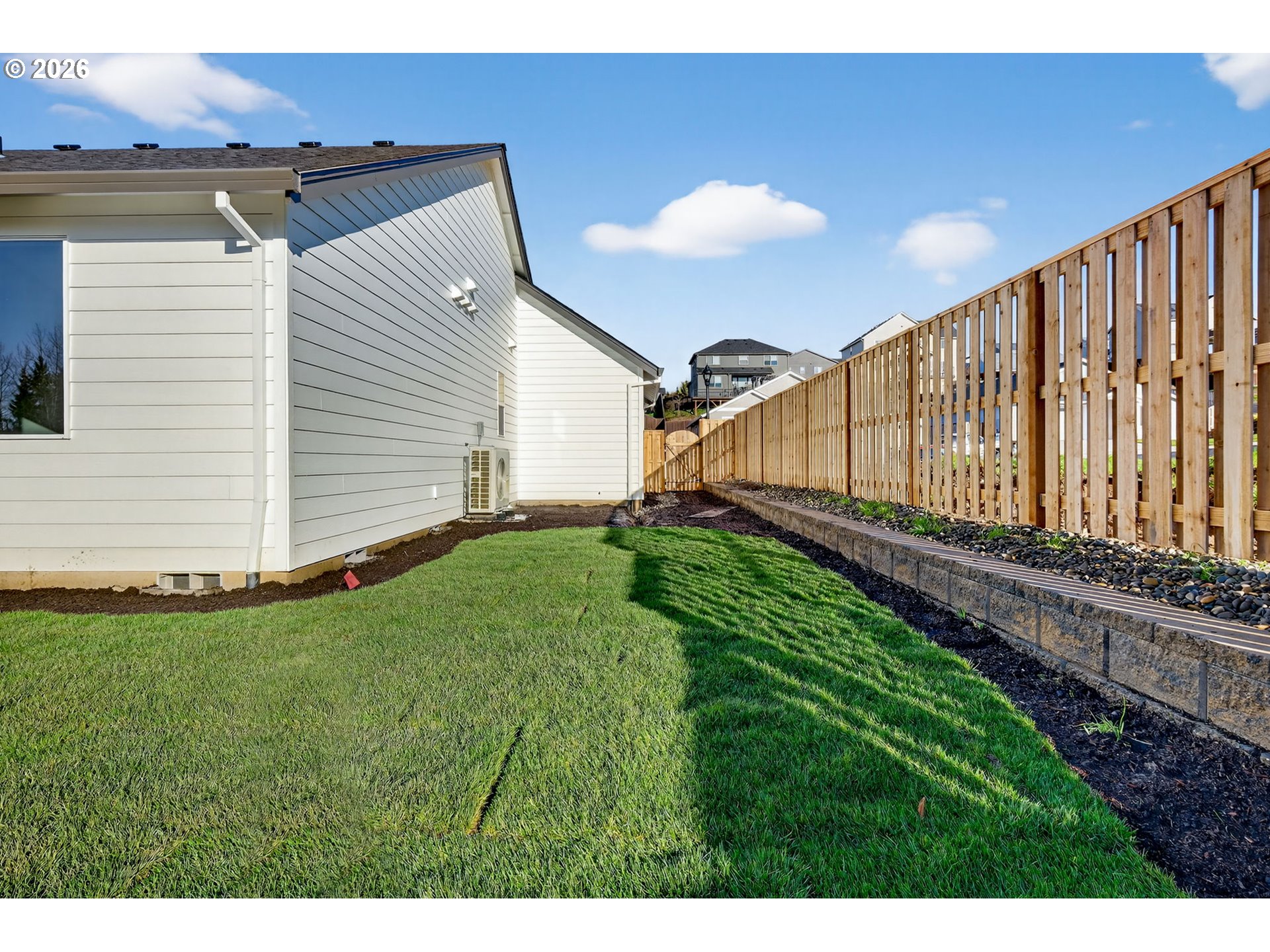 2240 East Otter Loop, Unit 52 La Center, WA 98629 - Photo 36 of 43 a view of a backyard with wooden fence