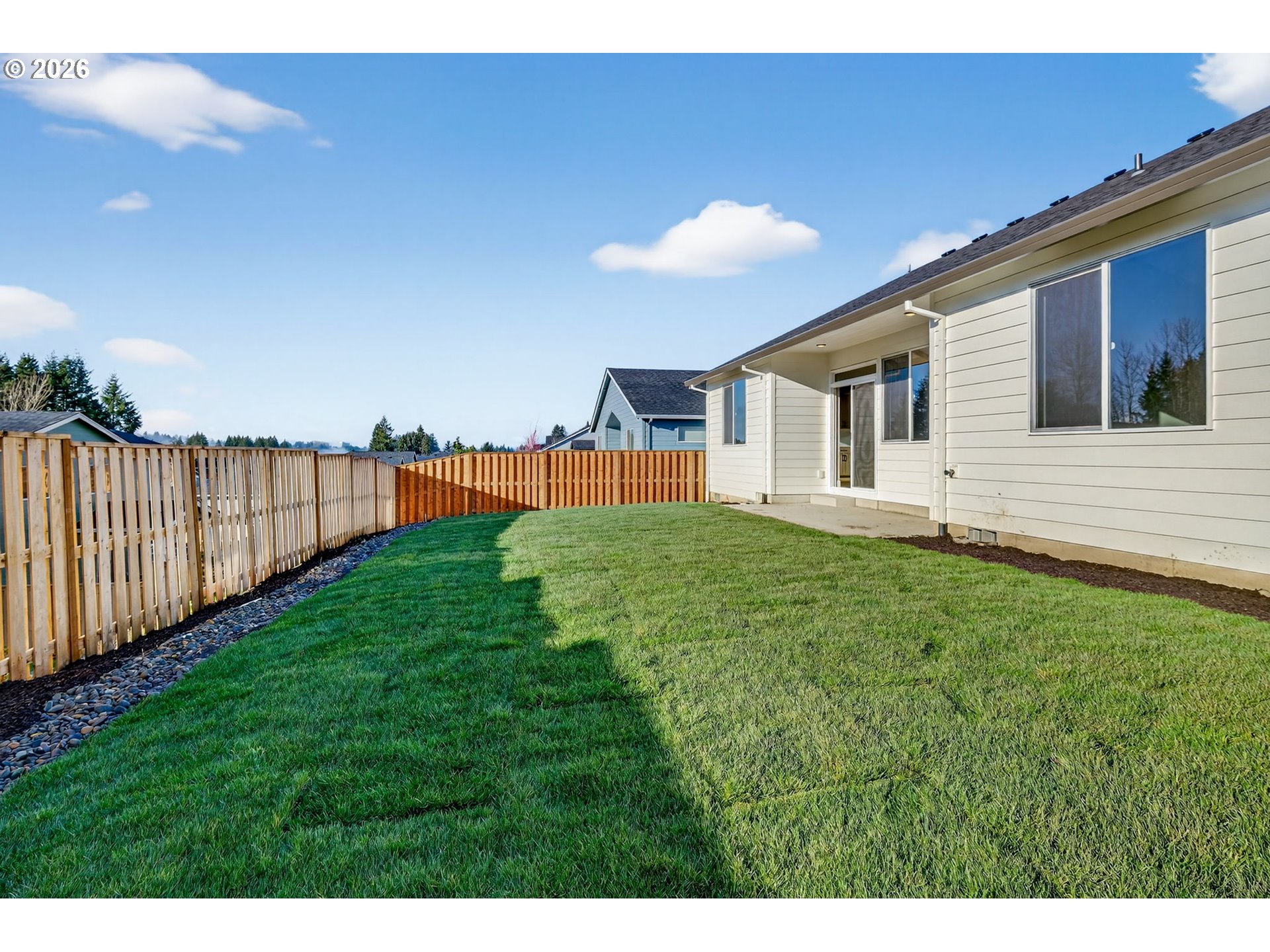 2240 East Otter Loop, Unit 52 La Center, WA 98629 - Photo 38 of 43 a view of a house with backyard and garden