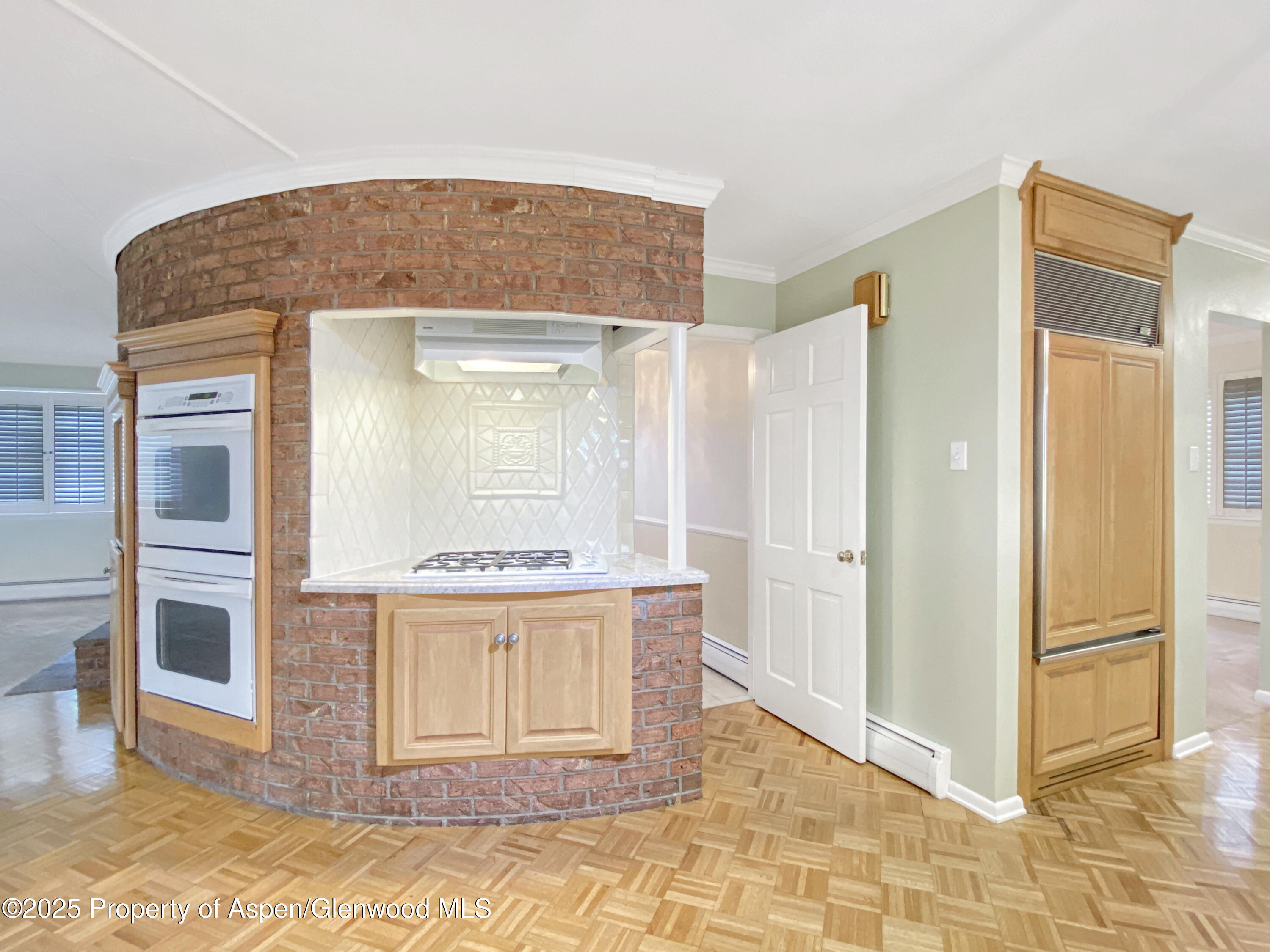 1509 County Road 4 Meeker, CO 81641 - Photo 8 of 37 a view of kitchen with granite countertop cabinets and refrigerator