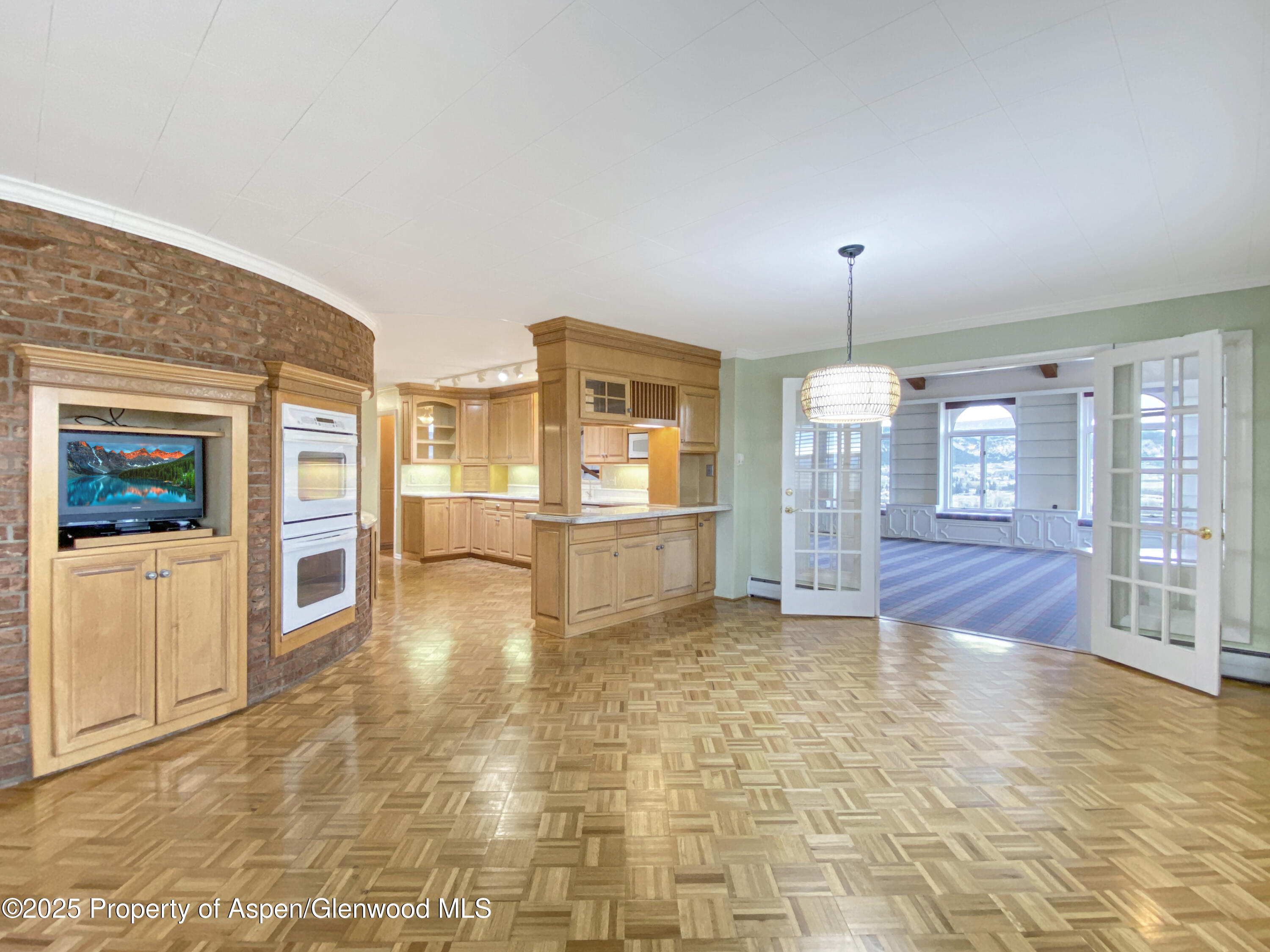 1509 County Road 4 Meeker, CO 81641 - Photo 10 of 37 a view of a livingroom with furniture wooden floor and window