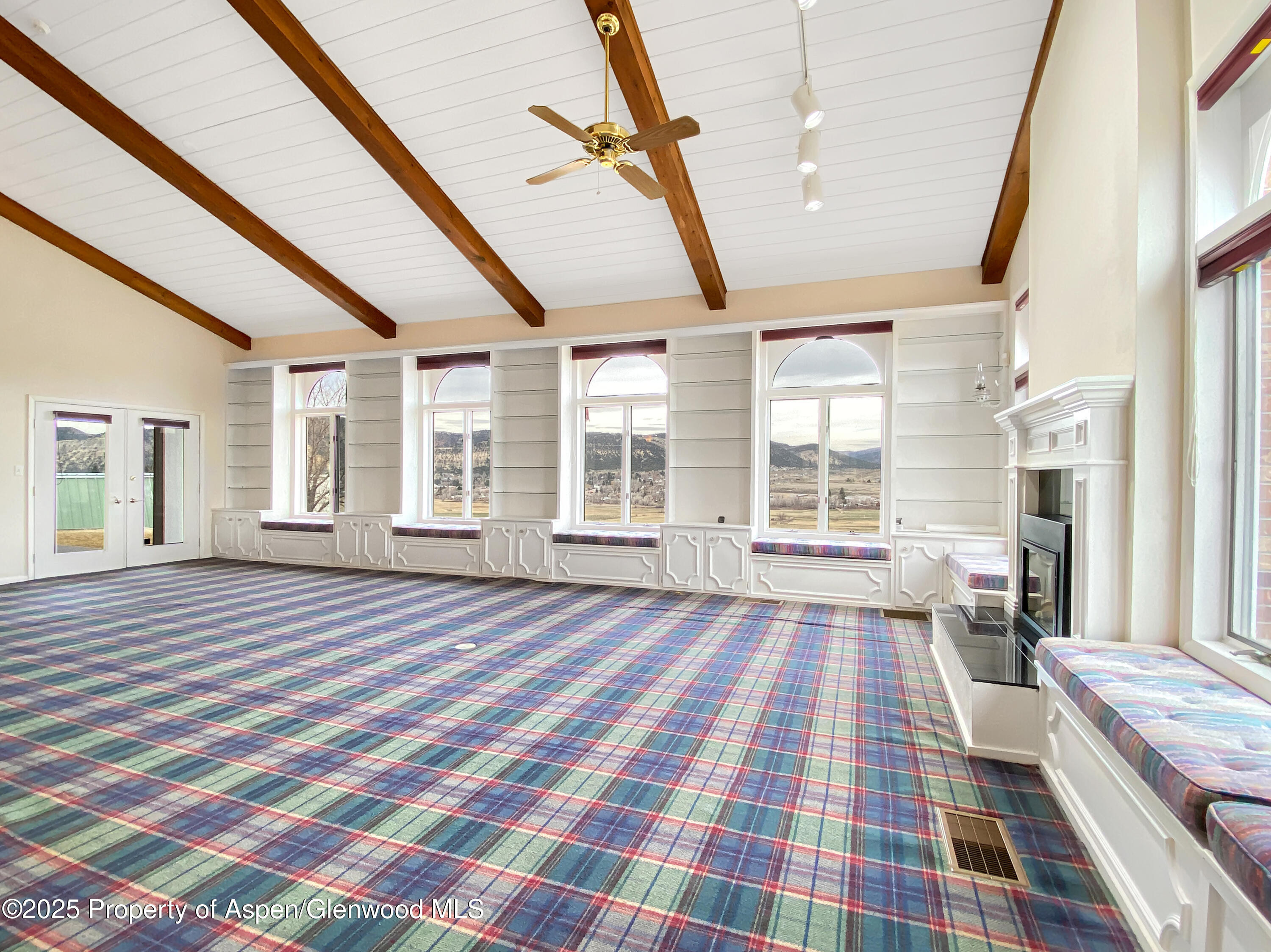 1509 County Road 4 Meeker, CO 81641 - Photo 11 of 37 a bedroom with a bed and a large window