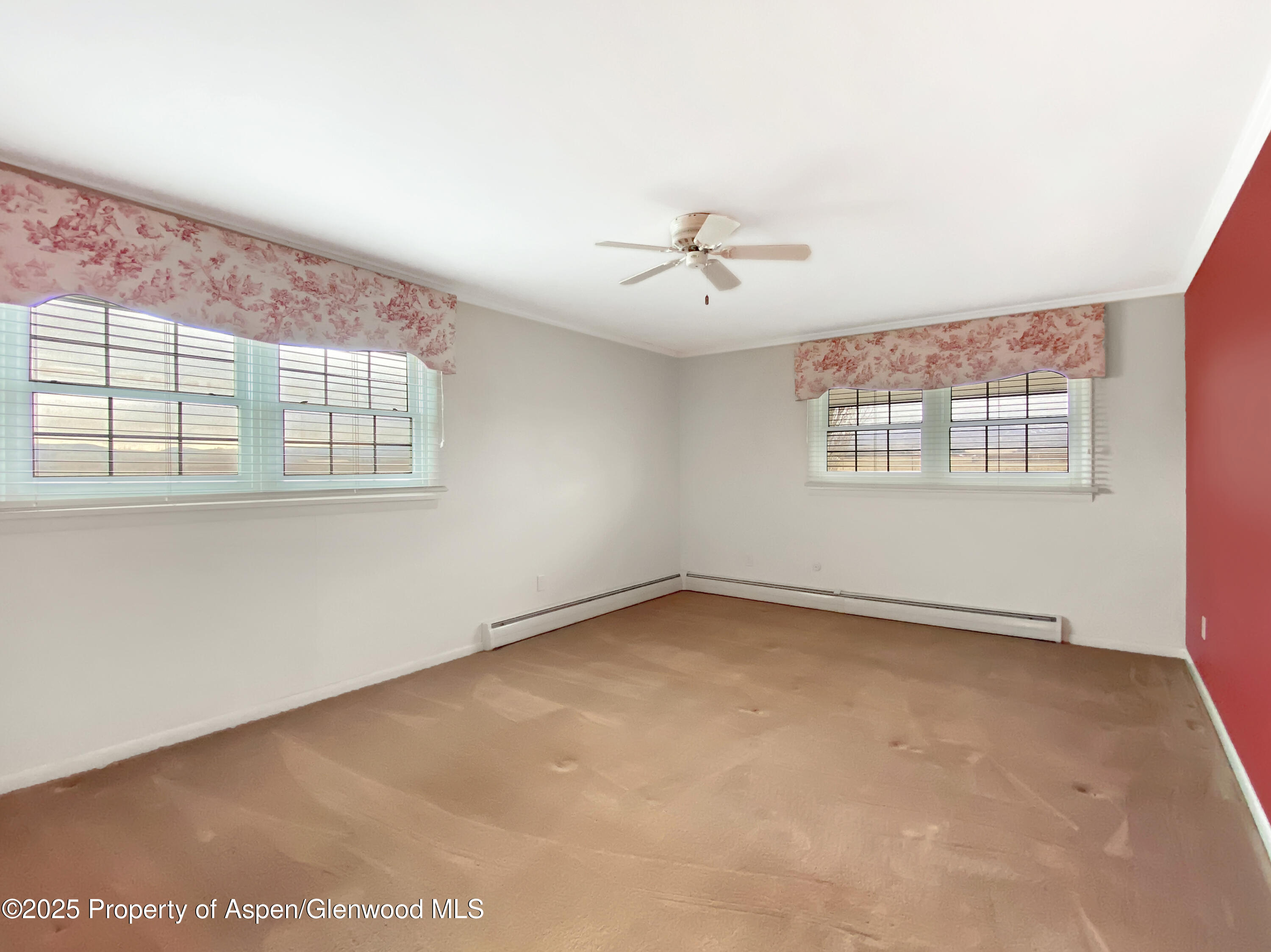 1509 County Road 4 Meeker, CO 81641 - Photo 16 of 37 a view of an empty room with a window