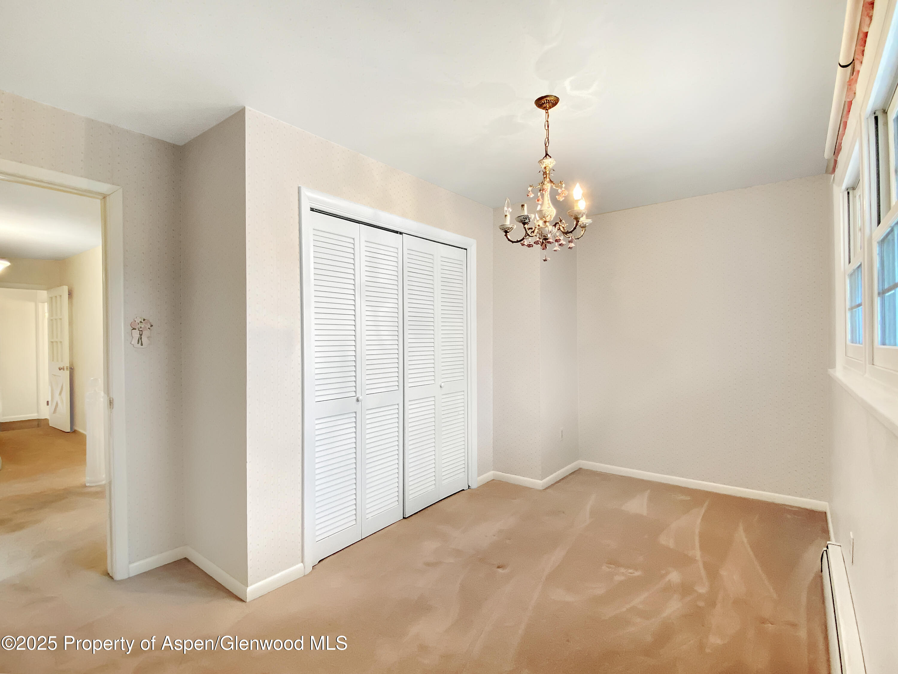 1509 County Road 4 Meeker, CO 81641 - Photo 22 of 37 a very nice looking room with a chandelier fan