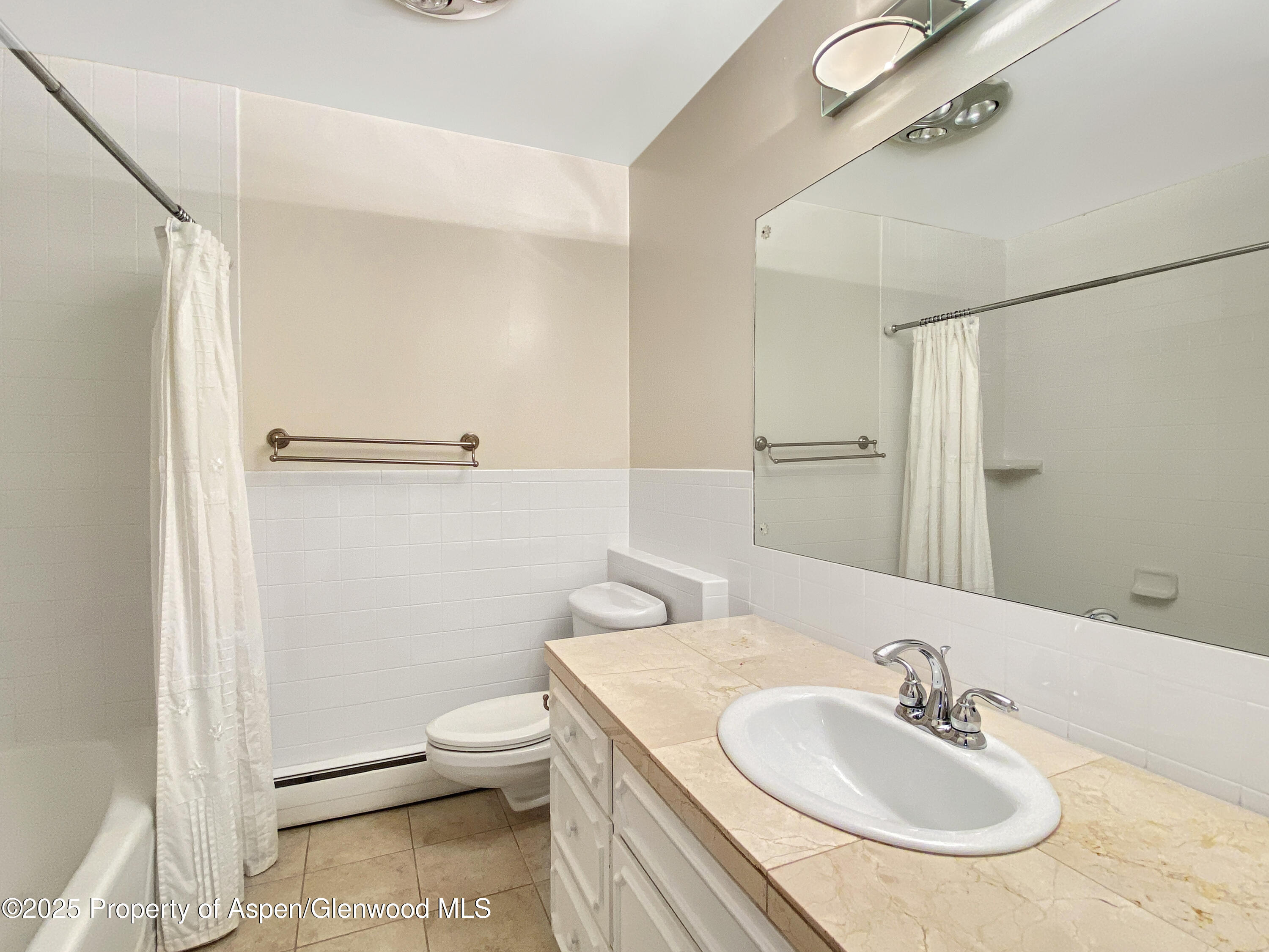 1509 County Road 4 Meeker, CO 81641 - Photo 27 of 37 a bathroom with a sink toilet and shower