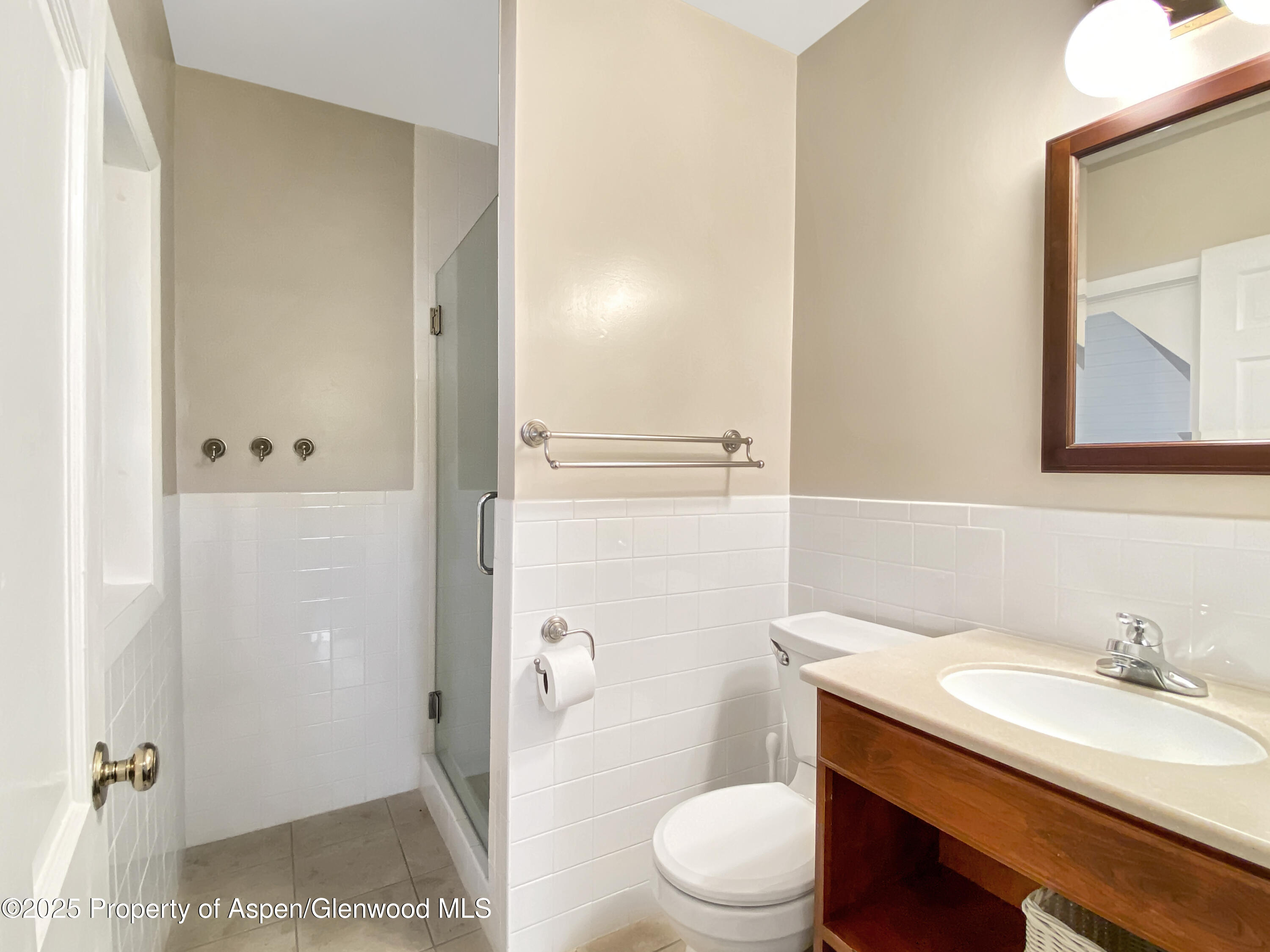 1509 County Road 4 Meeker, CO 81641 - Photo 29 of 37 a bathroom with a granite countertop sink toilet and shower