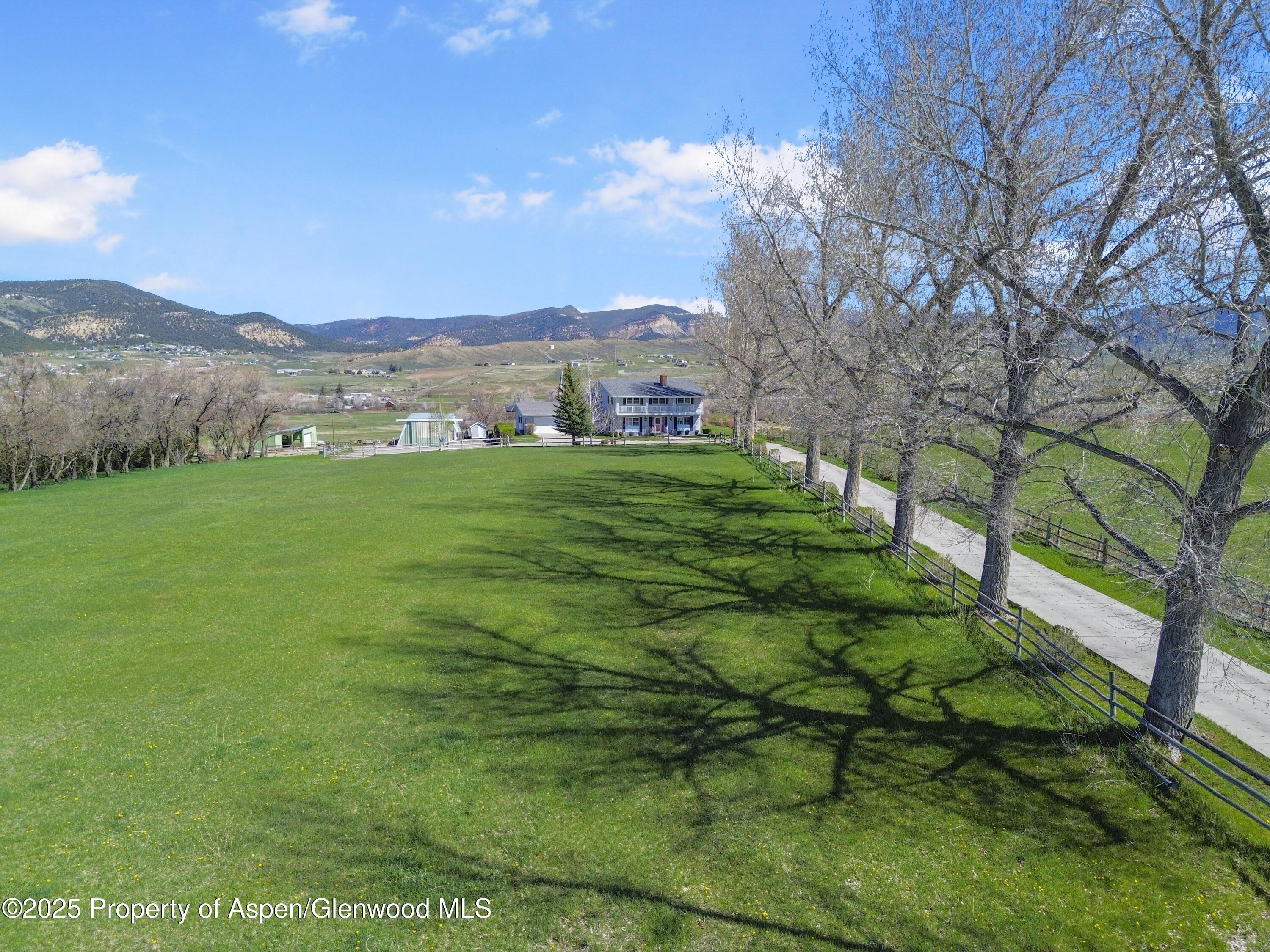 1509 County Road 4 Meeker, CO 81641 - Photo 34 of 37 a view of a grassy field with trees