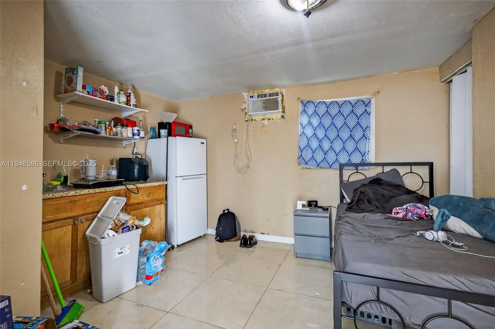 3581 West 2nd Avenue Hialeah, FL 33012 - Photo 23 of 32 a room with storage and utility