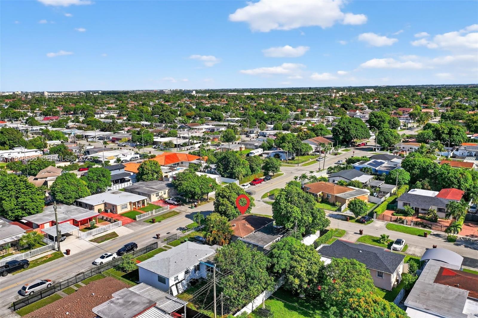 3581 West 2nd Avenue Hialeah, FL 33012 - Photo 28 of 32 an aerial view of residential houses with outdoor space