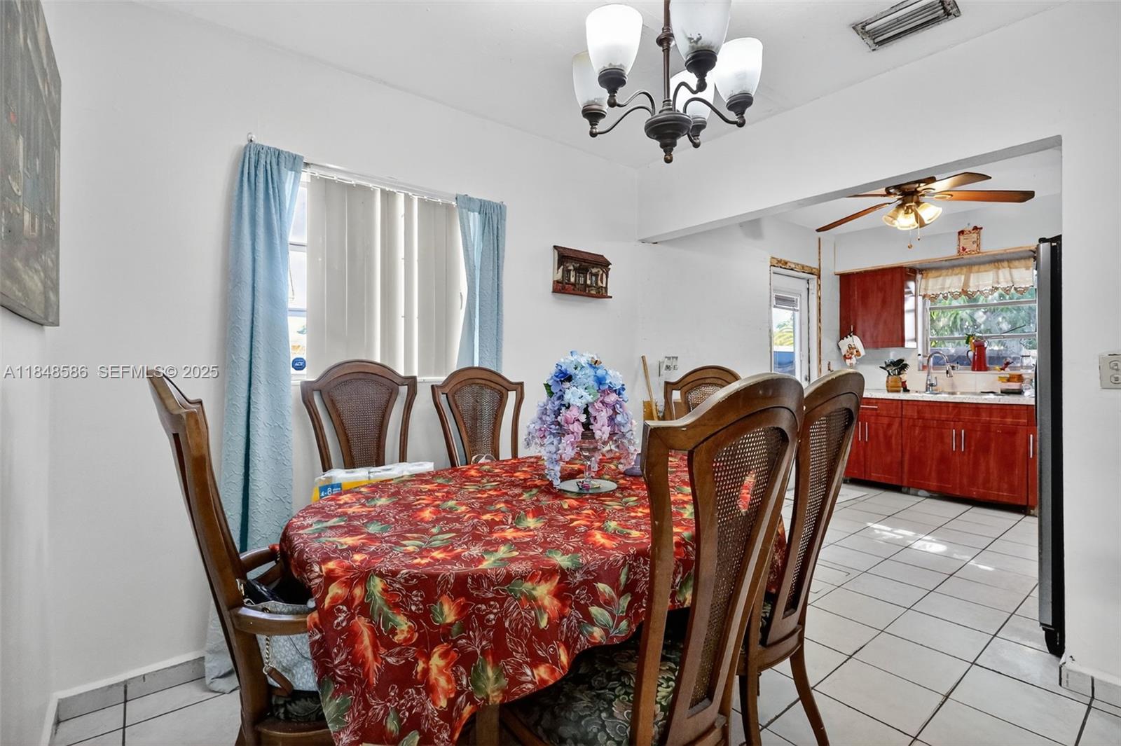 3581 West 2nd Avenue Hialeah, FL 33012 - Photo 7 of 32 a view of a dining room with furniture