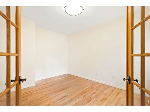 a bathroom with a bathtub and a window