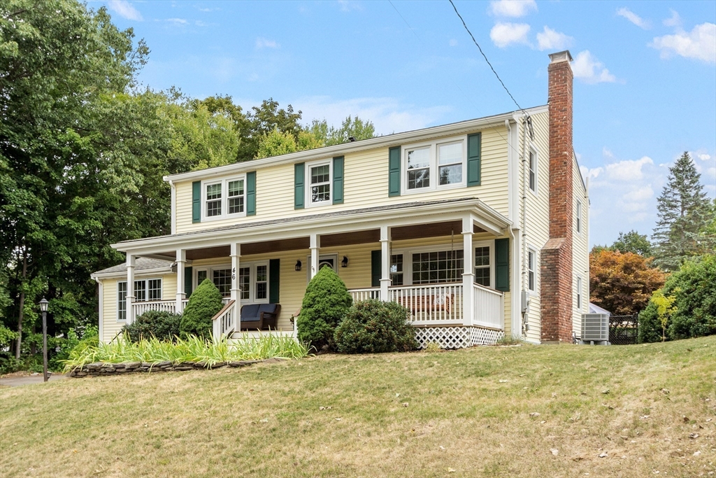46 Temi Road Hudson, MA 01749 - Photo 42 of 42 a front view of a house with a garden