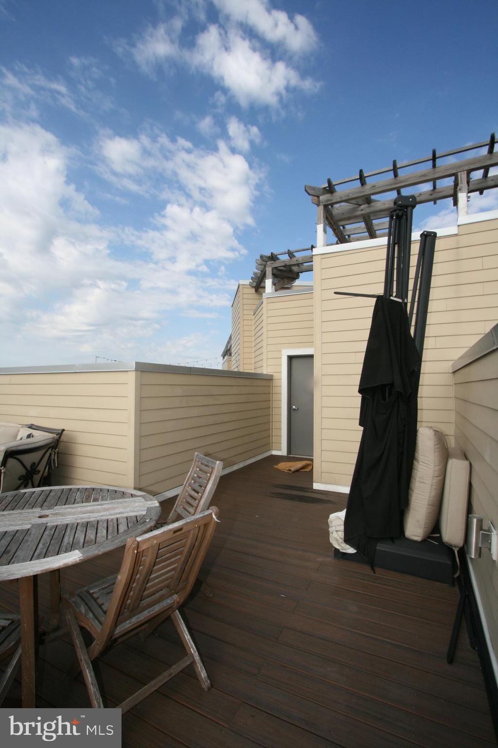 2550 17th Street Northwest, Unit 612 Washington, DC 20009 - Photo 30 of 55 a view of deck with patio