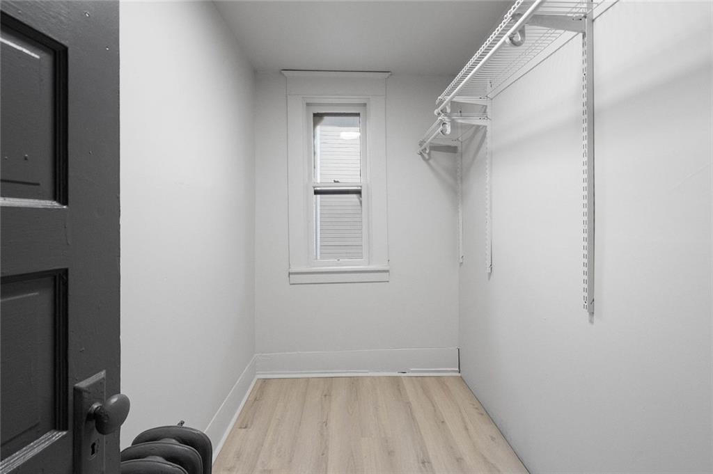 306 Park Road Ambridge, PA 15003 - Photo 19 of 43 a view of a room with racks on the wall